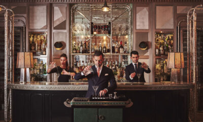 Maura Milia, Giorgio Bargiani, and Ago Perrone pouring drinks at The Connaught Bar