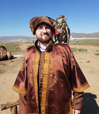 Charles Hoskinson Ethereum co-founder with a falcon on his shoulder