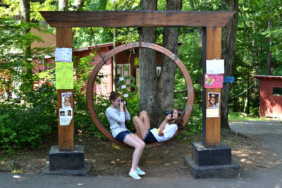 Kids taking photographs of each other at Buck’s Rock summer camp. Image courtesy of Buck’s Rock