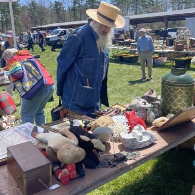 Noted collector and author Fritz Karch perused the wares at Brimfield. Photo courtesy of Andrew Nodell