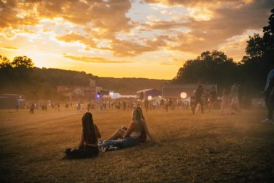 FORMAT Festival attendees chill out in the field. (Image © Charles Reagan)
