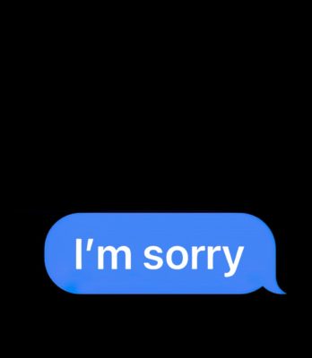 Photo of a text message that says I'm sorry.