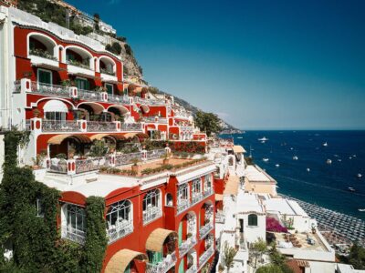 The red-and-white, vine-covered Le Sirenuse hotel in Positano, Italy