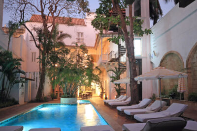 Lounge chairs by the pool at Casa Pestagua, Cartegena, Colombia